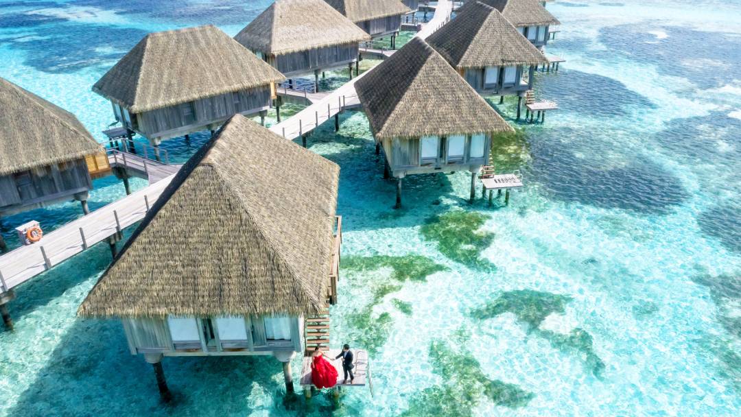 aerial photography of bungalows Maldives